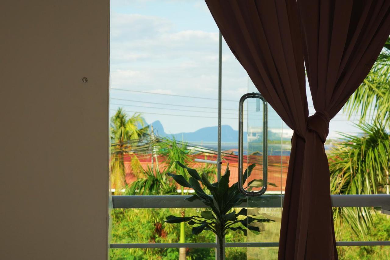 Ae Semporna Guesthouse 极潜旅店 Экстерьер фото