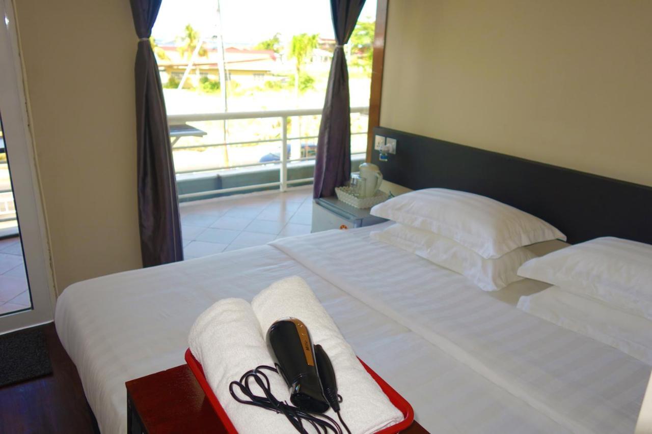 Ae Semporna Guesthouse 极潜旅店 Экстерьер фото