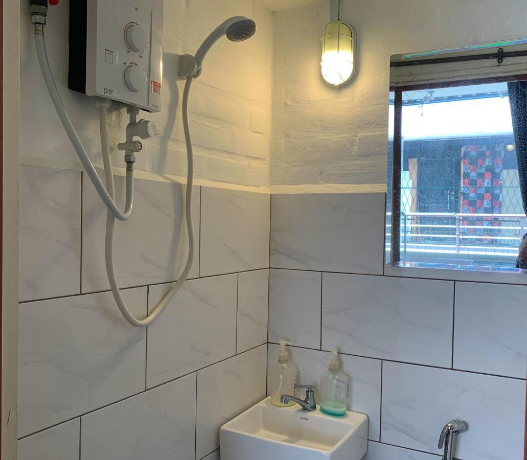 Ae Semporna Guesthouse 极潜旅店 Экстерьер фото